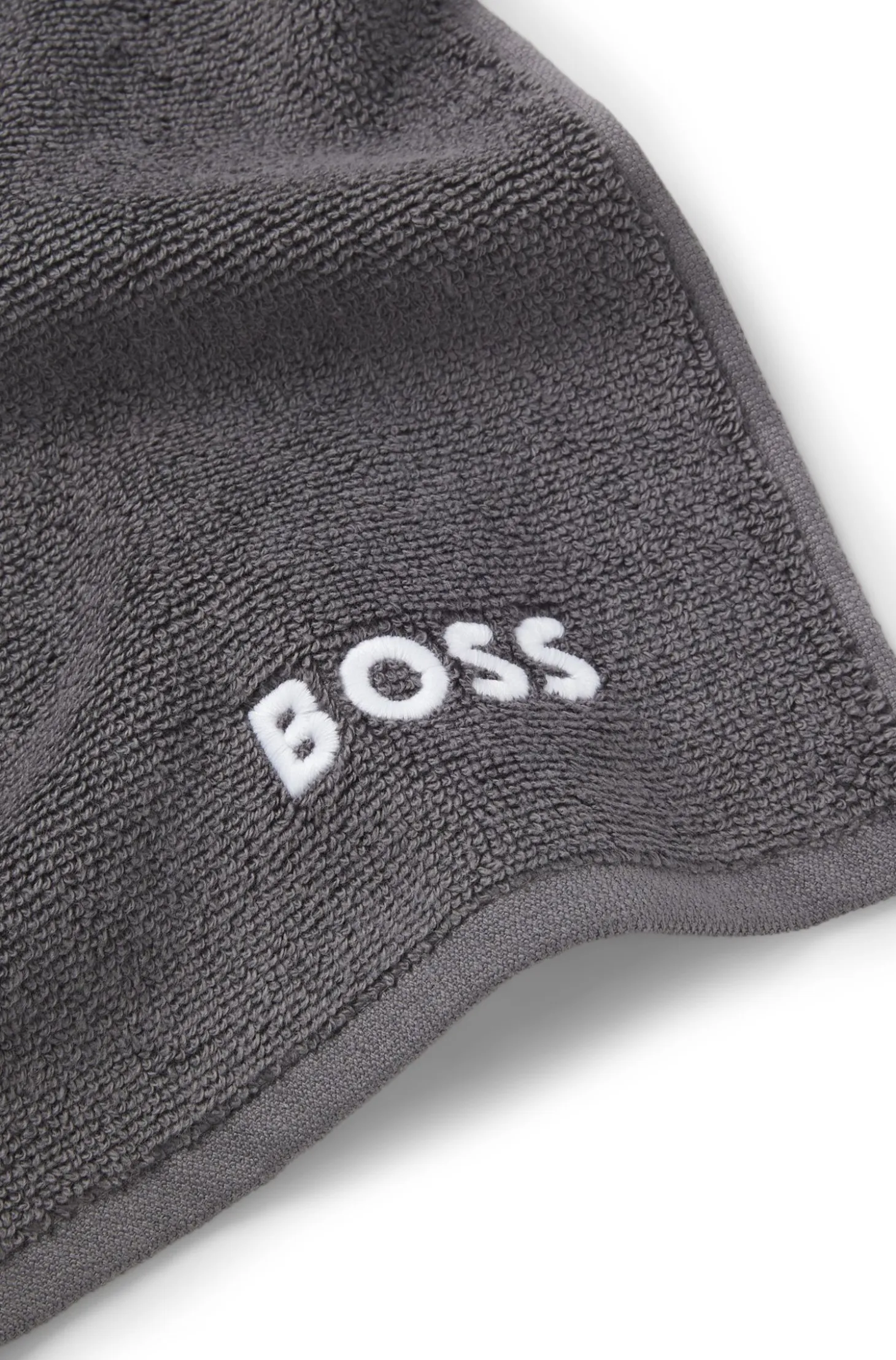 Cotton face cloth with contrast embroidered logo
