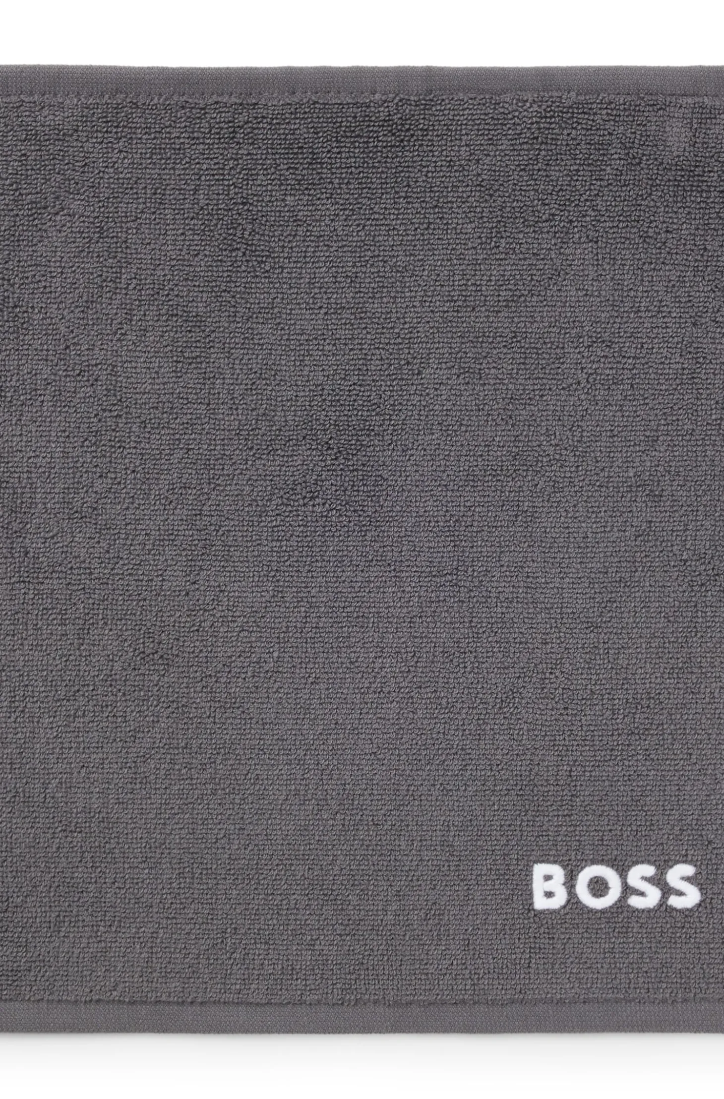 Cotton face cloth with contrast embroidered logo