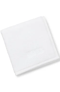 Cotton face cloth with contrast embroidered logo