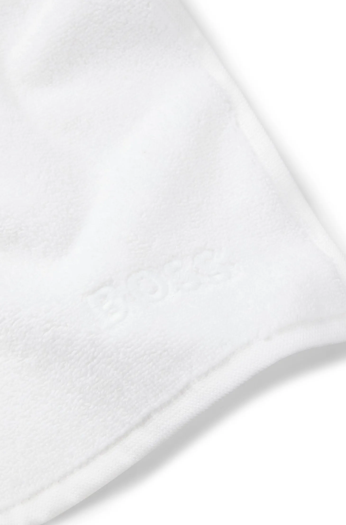 Cotton face cloth with contrast embroidered logo