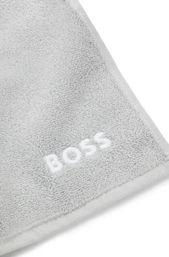 Cotton face cloth with contrast embroidered logo