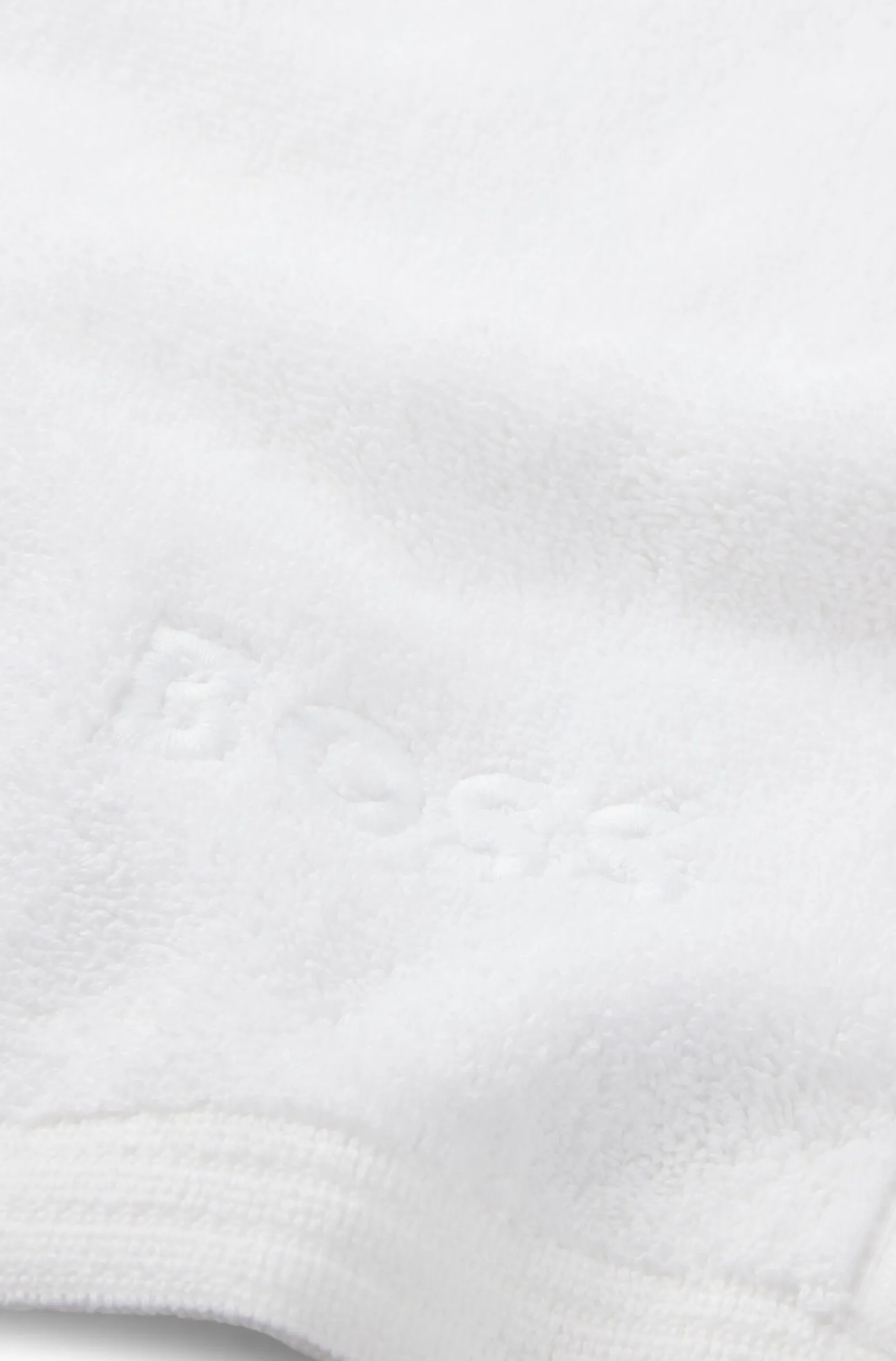 Cotton guest towel with contrast embroidered logo