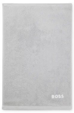 Cotton guest towel with contrast embroidered logo