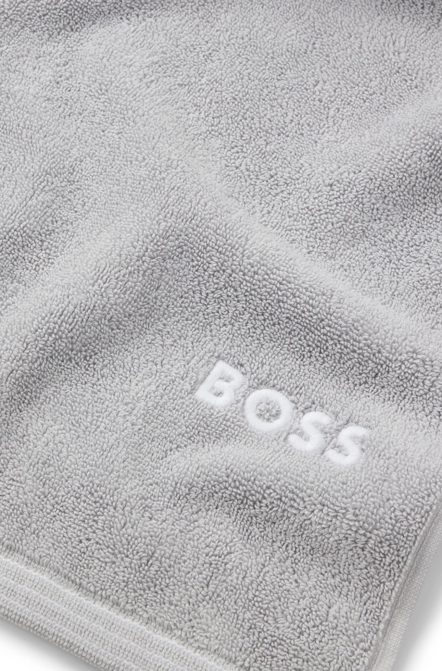 Cotton hand towel with contrast embroidered logo