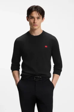 Cotton sweater with red logo label