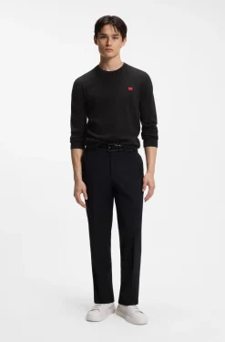 Cotton sweater with red logo label