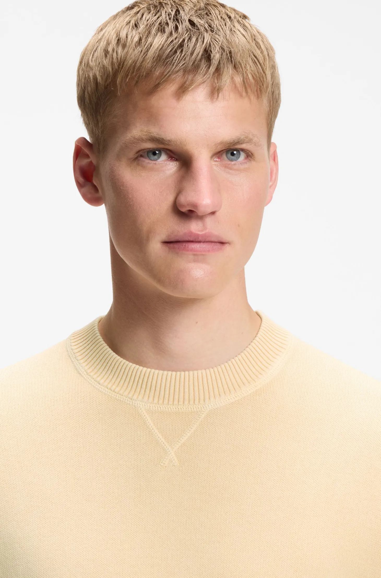 Cotton sweater with ribbed side seams