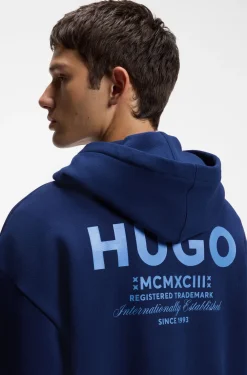 Cotton-terry loose-fit hoodie with logo details