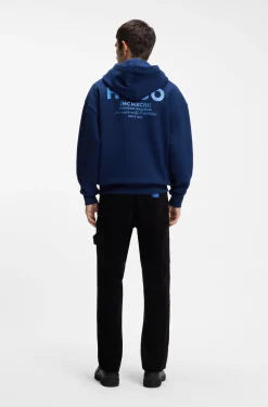 Cotton-terry loose-fit hoodie with logo details