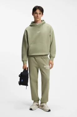Cotton-terry loose-fit hoodie with logo details