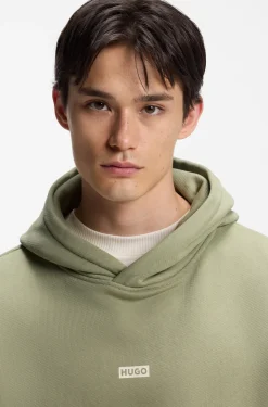 Cotton-terry loose-fit hoodie with logo details