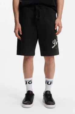 Cotton-terry shorts with logo artwork