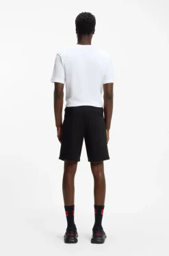 Cotton-terry shorts with red logo label
