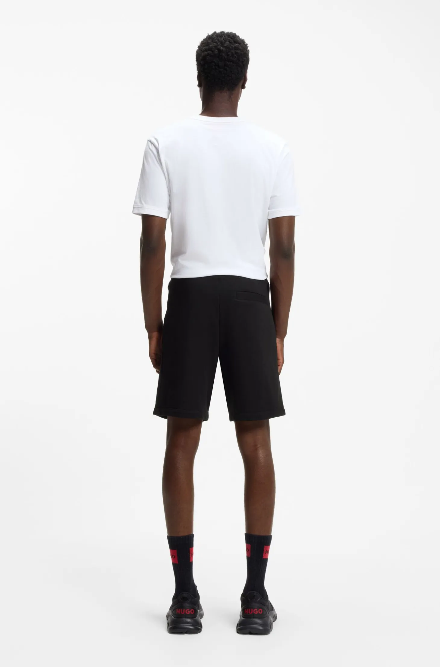 Cotton-terry shorts with red logo label