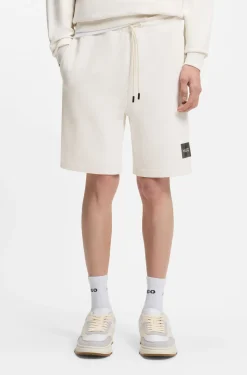 Cotton-terry shorts with tortoiseshell logo