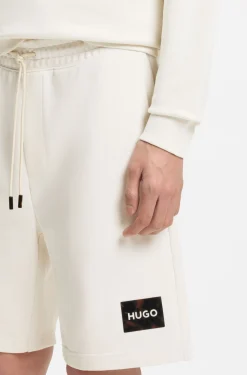 Cotton-terry shorts with tortoiseshell logo