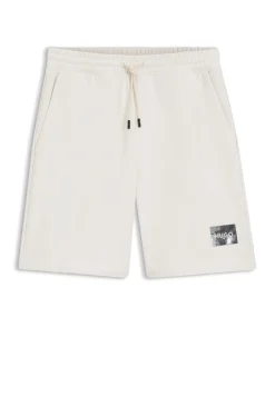 Cotton-terry shorts with tortoiseshell logo