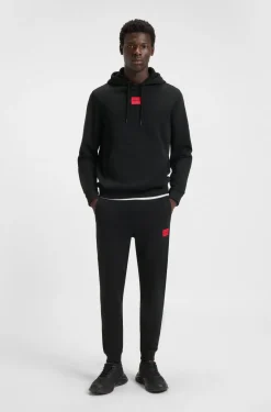 Cotton-terry tracksuit bottoms with red logo label