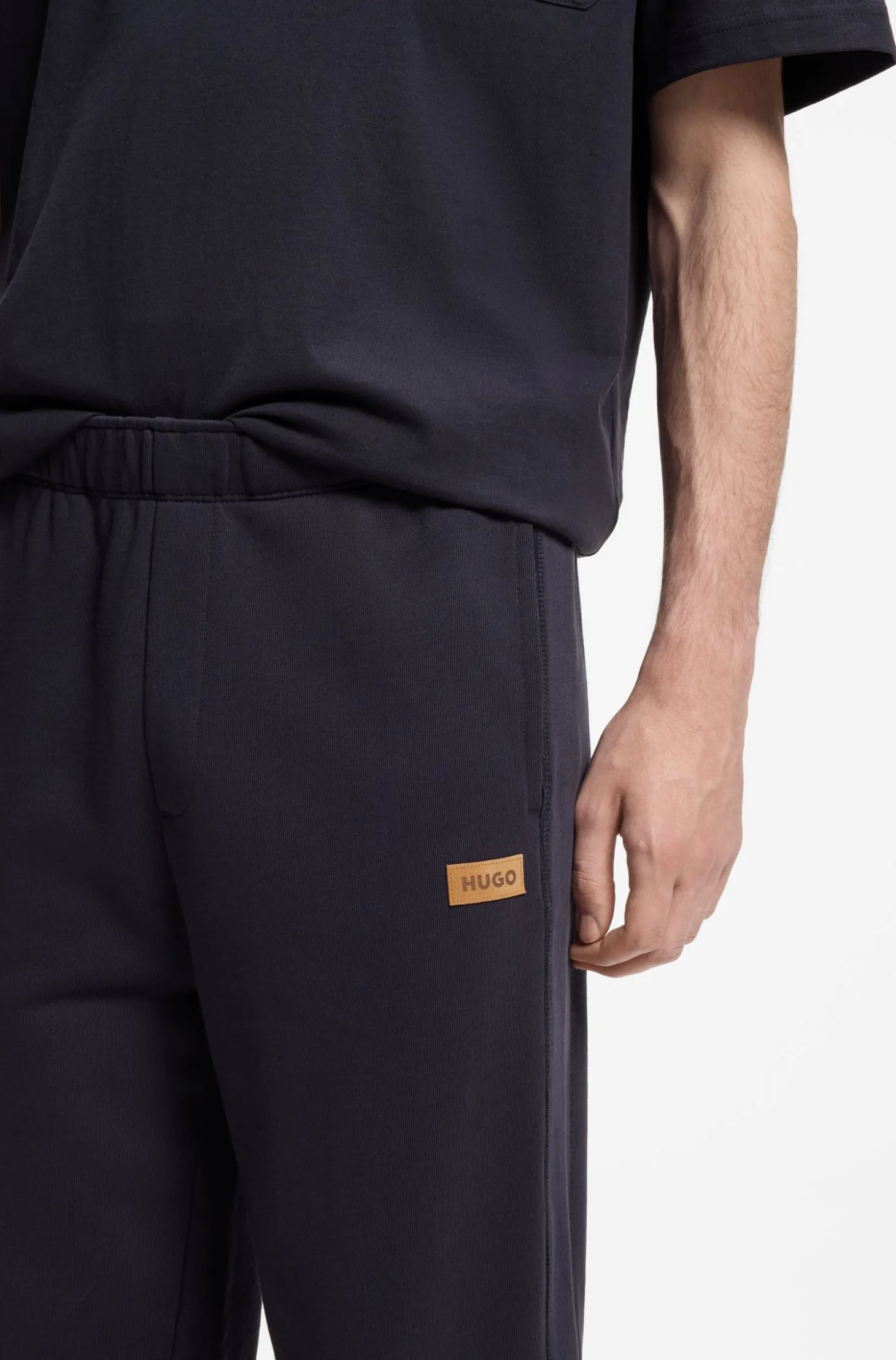 Cotton-terry tracksuit bottoms with logo badge