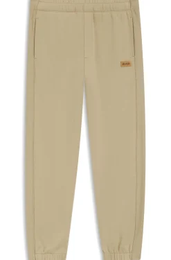 Cotton-terry tracksuit bottoms with logo badge