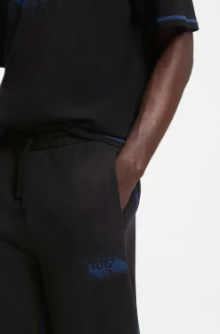 Cotton-terry tracksuit bottoms with logo and contrast stitching