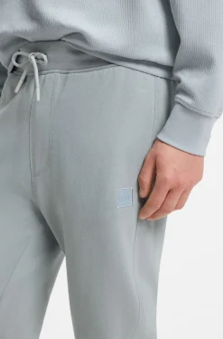 Cotton-terry tracksuit bottoms with logo patch