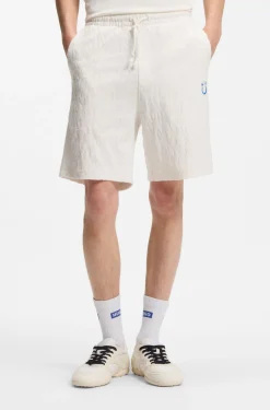 Cotton-towelling shorts with leopard jacquard
