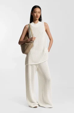Cotton trousers with micro-lace structure