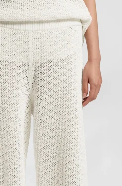 Cotton trousers with micro-lace structure