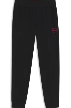 Cuffed loungewear bottoms in stretch cotton with logo print