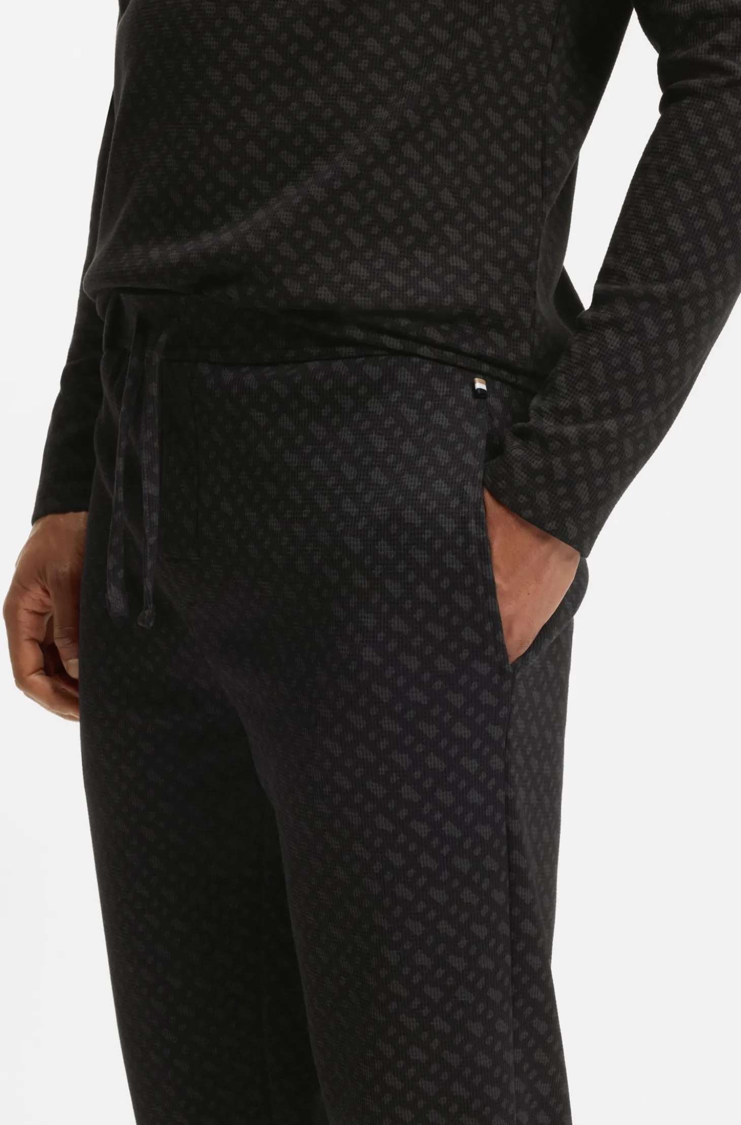 Cuffed pyjama bottoms in monogram-print waffle fabric