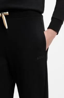 Cuffed tracksuit bottoms with signature-stripe drawcord