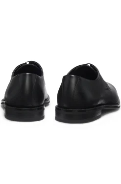 Derby shoes in smooth and textured leather