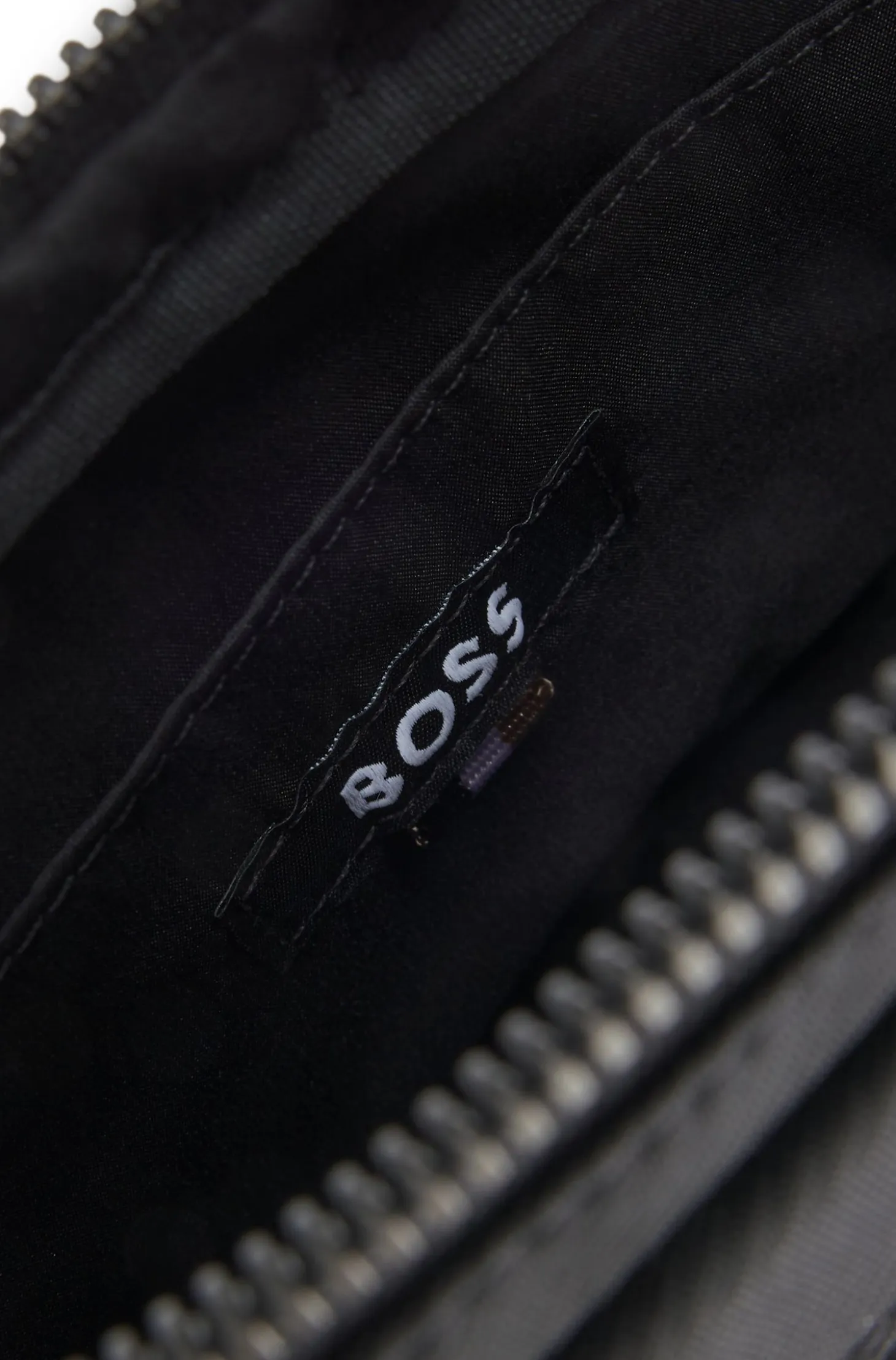 Diamond-structured crossbody bag with tonal logo