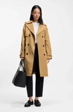 Double-breasted trench coat with buckled belt