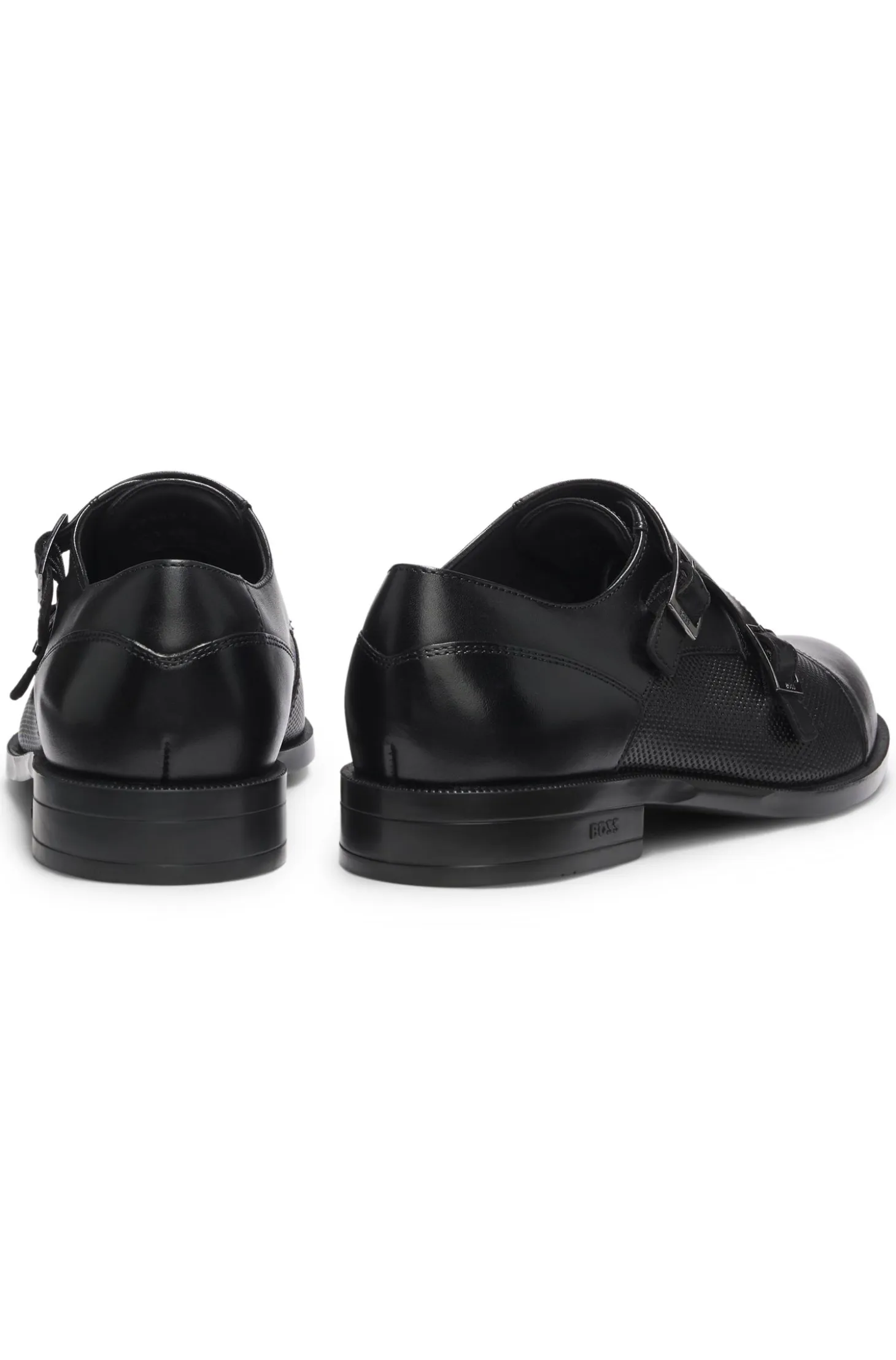 Double monk shoes in leather with perforated detail