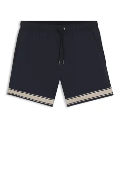 Drawstring swim shorts in stretch fabric with tape trim