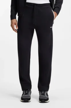 Drawstring trousers in cotton-blend jersey