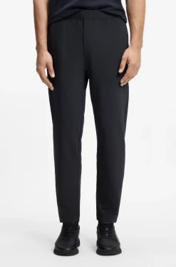 Drawstring trousers in stretch waffle fabric with framed zip