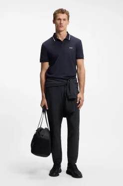 Drawstring trousers in stretch waffle fabric with framed zip