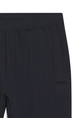 Drawstring trousers in stretch waffle fabric with framed zip