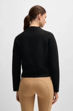 Equestrian cardigan with concealed closure