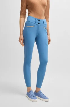 Equestrian full-grip breeches with four-way stretch