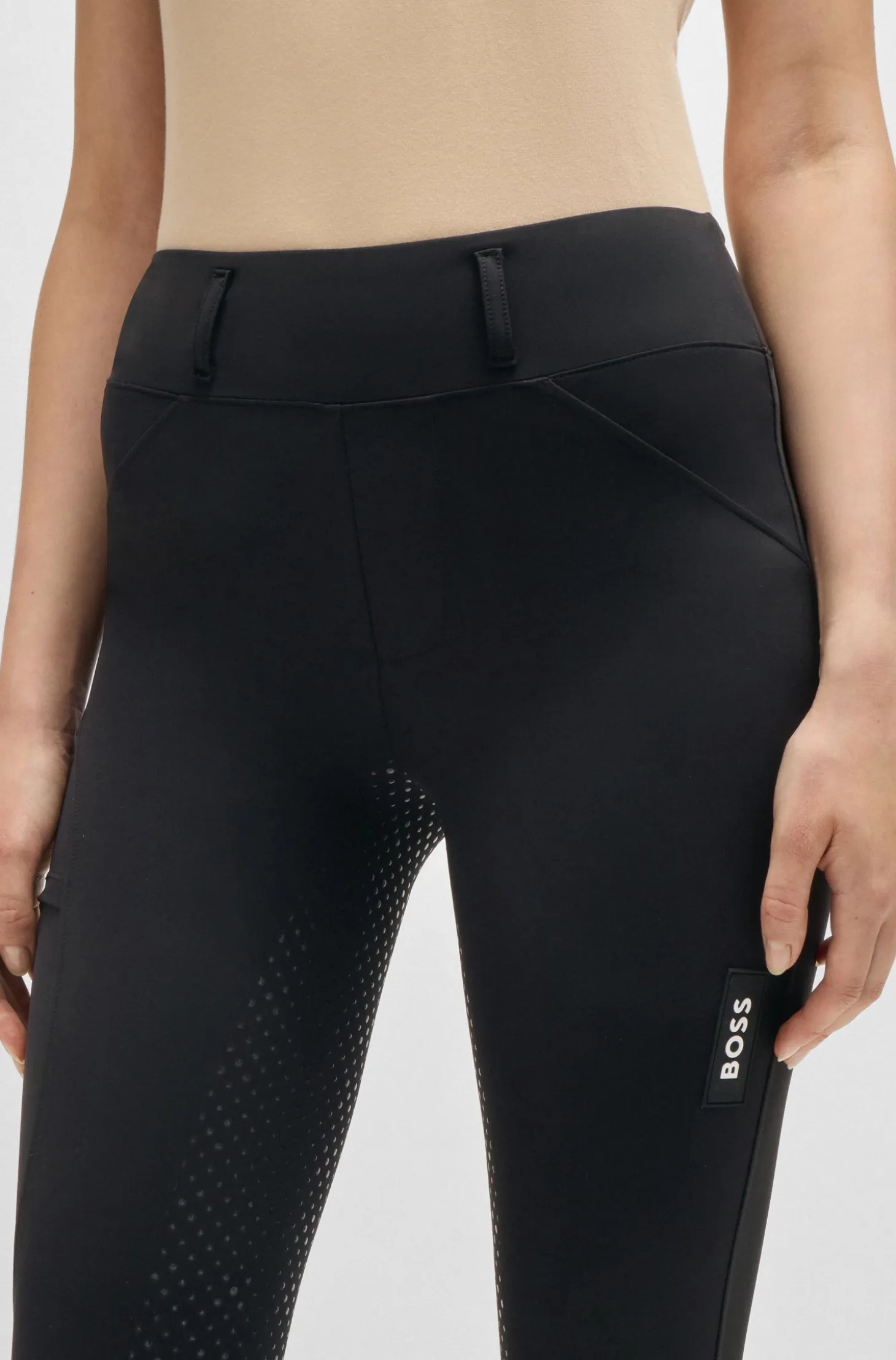 Equestrian full-grip breeches with four-way stretch