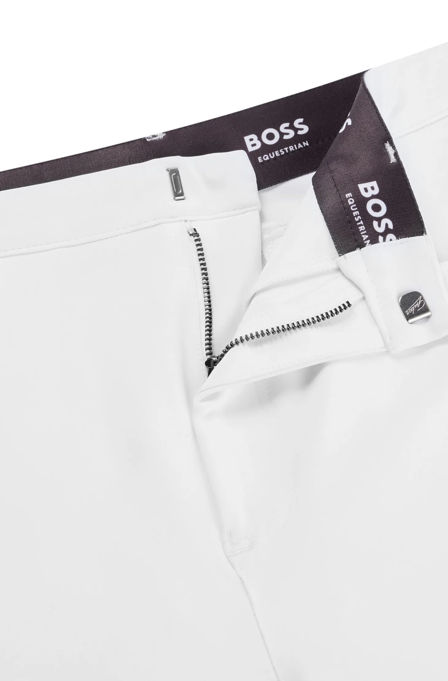 Equestrian knee-grip breeches in power-stretch material