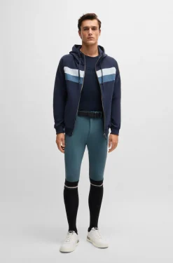 Equestrian knee-grip breeches with four-way stretch