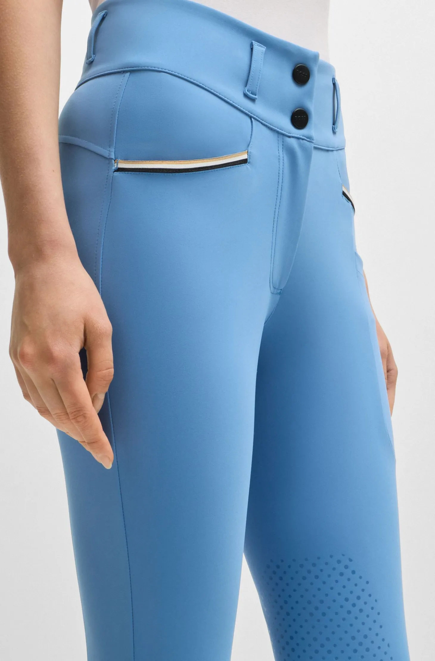 Equestrian knee-grip breeches with four-way stretch