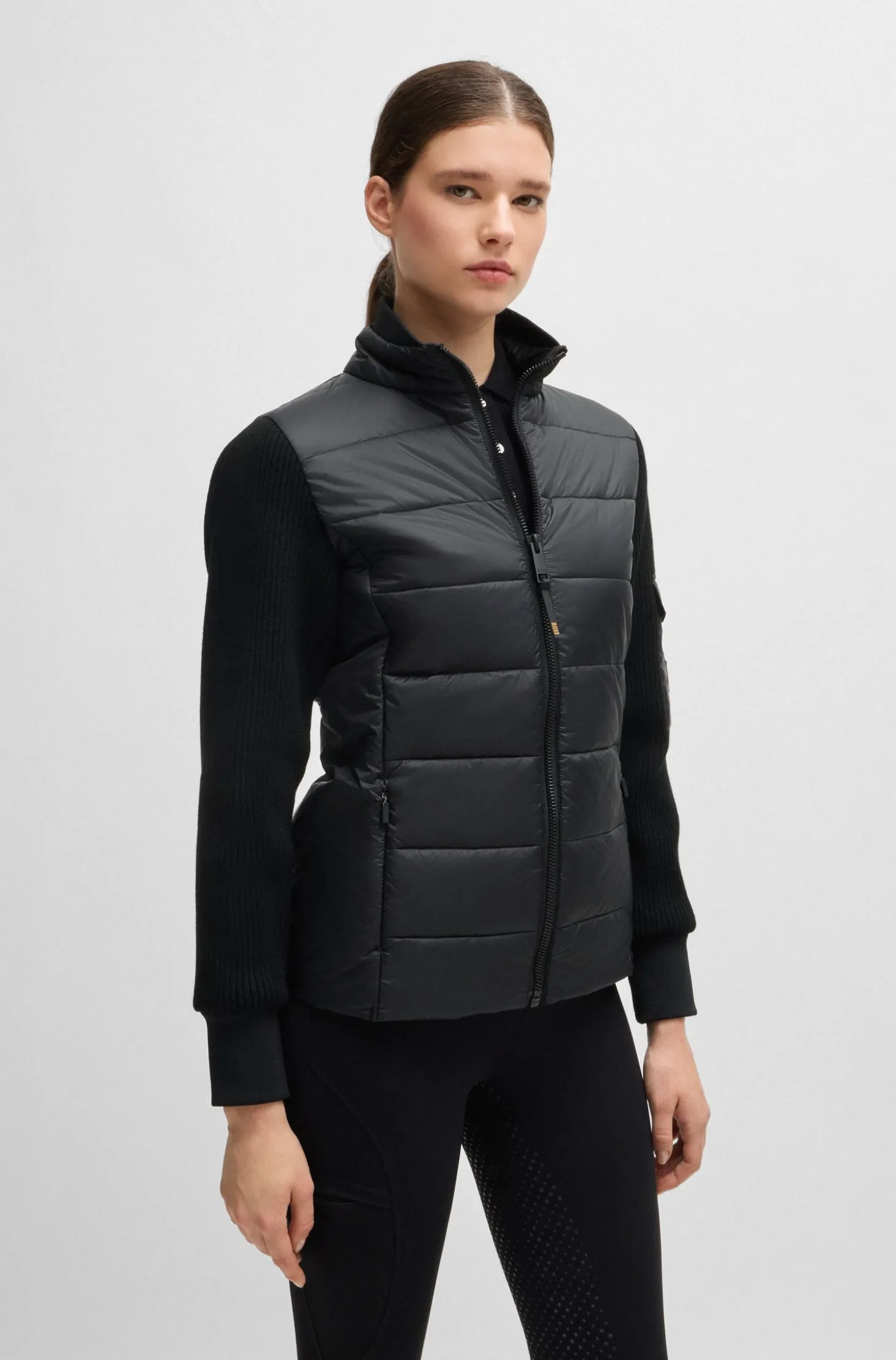 Equestrian mixed-material jacket with sleeve pocket