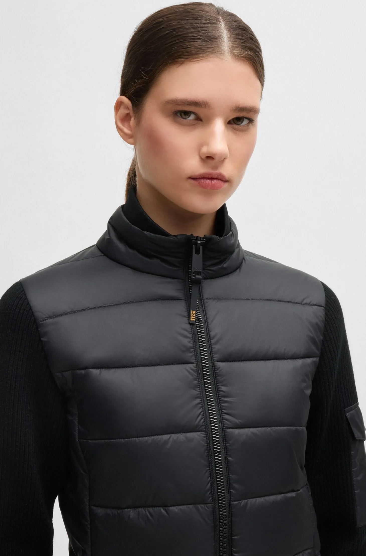 Equestrian mixed-material jacket with sleeve pocket