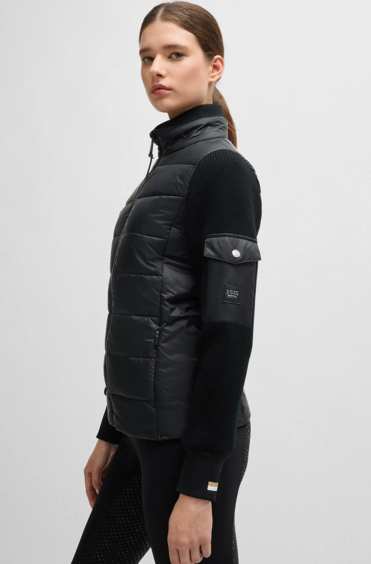 Equestrian mixed-material jacket with sleeve pocket